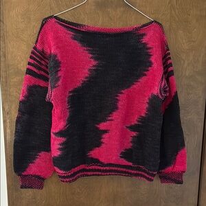 Vibrant Off-the-Shoulder Pink and Black Sweater